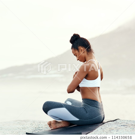 Fitness, meditation and yoga with woman on beach for mental health, peace or wellness in morning. Exercise, training and zen with sporty person on mat at coast by ocean or sea for balance and mindset Fitness, meditation and yoga with woman on beach for mental health, peace or wellness in morning. Exercise, training and zen with sporty person on mat at coast by ocean or sea for balance and mindset 114330658