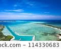 [Okinawa, Miyakojima] Drone shot of Ikema Island, Ikema Bridge, and the blue sea from above Karimata Fishing Port① 114330683