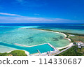 [Okinawa, Miyakojima] Drone shot of Ikema Island, Ikema Bridge, and the blue sea from above Karimata Fishing Port ④ 114330687