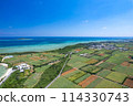 [Okinawa, Miyakojima] Drone shot of the west coast and Ogami Island from above Karimata village① 114330743