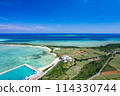 [Okinawa, Miyakojima] Drone shot of the west coast and Ogami Island from above Karimata village ② 114330744