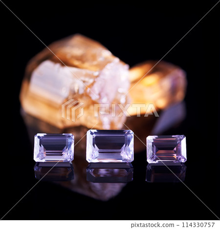 Gemstone, citrine and amethyst in studio with isolated black background for natural resource, jewel and sparkle for luxury. Rock, crystal and reflection in closeup for shine, glow and mineral 114330757