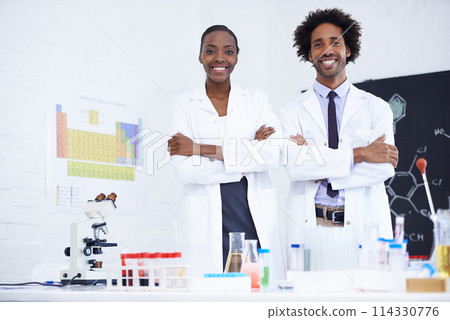 Scientist, portrait and arms crossed with teamwork in laboratory for chemical research, medical study and happy. Science, african collaboration and face with confidence for pharmaceutical experiment 114330776