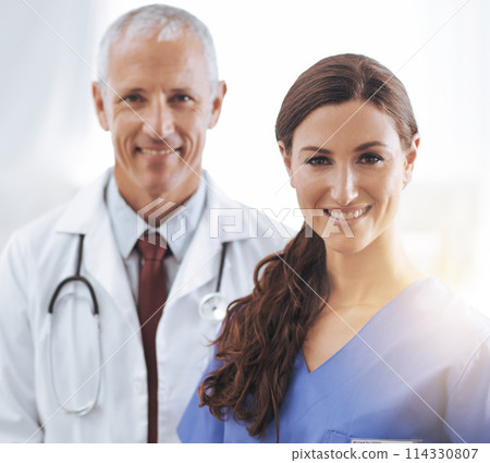 Doctor, nurse and happy together in portrait with smile, medical support and wellness in hospital. Medic, mature man and woman in team, smile and healthcare services in clinic with pride for career 114330807