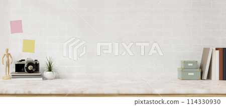 A marble white tabletop with objects and space for display products against the white tile wall. A marble white tabletop with objects and space for display products against the white tile wall. 114330930