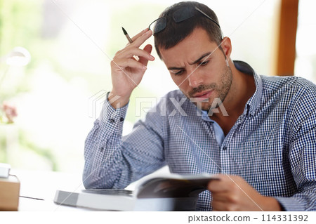 Professional man, research and stress for project in startup company, burnout and anxiety for business. Notebook, reading and thinking of ideas in home for learning, career and confused. Professional man, research and stress for project in startup company, burnout and anxiety for business. Notebook, reading and thinking of ideas in home for learning, career and confused. 114331392