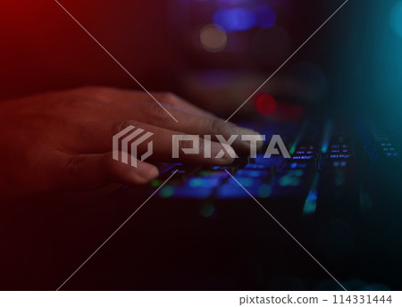 Hands, neon and keyboard for internet event, online and gaming with person at home in dark room. Influencer, gen z and gamer with playing for esports, video game or live streaming in bedroom in house 114331444