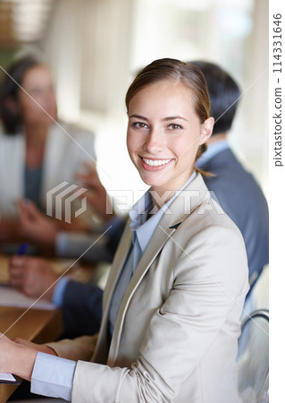 Businesswoman, meeting and company office in portrait with people for business, planning and strategy. Corporate woman, conference and smile in workplace with table for working, idea and career 114331646