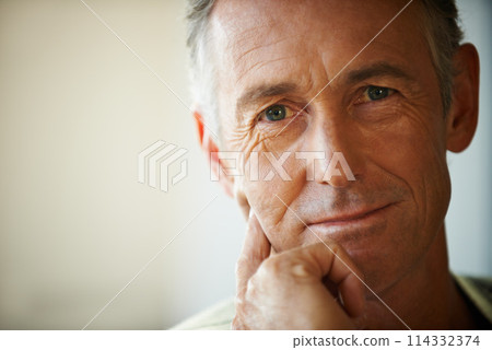 Headshot, senior man and portrait thinking about retirement at home, apartment and living room with mockup space. Hand, idea and mature male person in house to relax in lounge for elderly care 114332374
