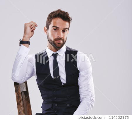 Studio, portrait and confident employee with chair, man and worker for corporate company, pride and stylish. Adult, male person and guy in suit for aesthetic, fashion and smile in white background Studio, portrait and confident employee with chair, man and worker for corporate company, pride and stylish. Adult, male person and guy in suit for aesthetic, fashion and smile in white background 114332575