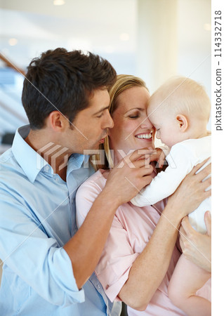 Mother, father and baby or love connection in home with childhood development, security or bonding. Man, woman and kid embrace together as family peace with hugging parent care, comfort or support Mother, father and baby or love connection in home with childhood development, security or bonding. Man, woman and kid embrace together as family peace with hugging parent care, comfort or support 114332718