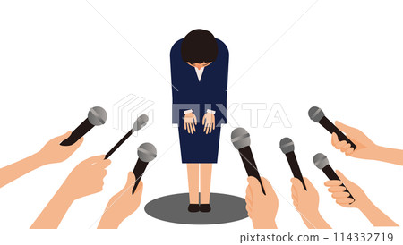 A woman in a suit bowing her head and many hands pointing microphones 114332719