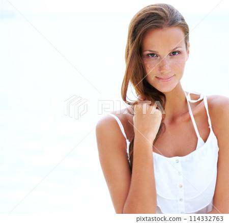 Portrait, woman and relax on vacation in nature, happy and travel n in summer to tropical island. Young person, smile and face with wellness at beach resort, peace and holiday for leisure in outdoor 114332763