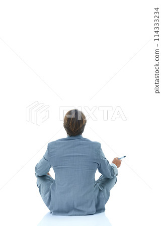Businessman, back and relax with marker in studio for planning, brainstorming or thinking on a white background. Rear view of man, employee or model with pen for idea or solution on mockup space 114333234