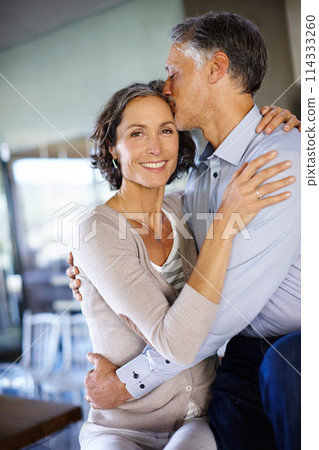 Portrait, smile and couple with hug, embrace and relationship with love or happiness at home. Face, man and happy woman with kiss on forehead, affection and bonding with marriage or romantic 114333260