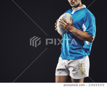 Black background, man and ball for rugby sport, closeup and mockup space, sportswear and professional for workout. Male person or player, fitness and athlete for football game or match and strong 114333372