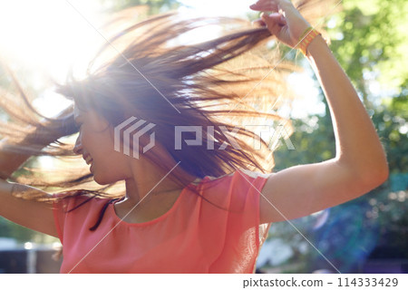 Woman, dancing or happy in nature with energy, wellness or celebration for fresh air in forest. Person, dancer or creative with body movement for fitness, fun or outdoor adventure on summer vacation Woman, dancing or happy in nature with energy, wellness or celebration for fresh air in forest. Person, dancer or creative with body movement for fitness, fun or outdoor adventure on summer vacation 114333429