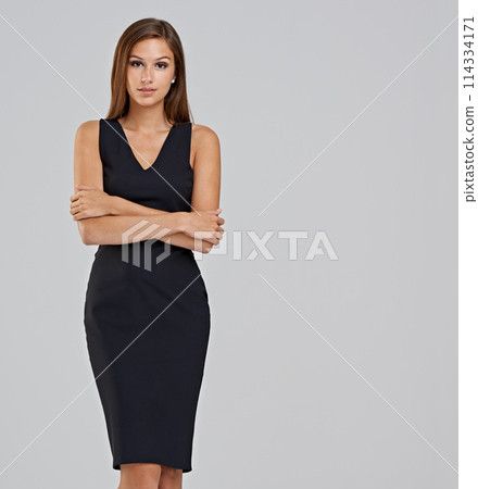 Businesswoman, portrait and confidence in studio for career as financial account, grey background or mockup space. Female person, face and company growth for small business, start up or development 114334171