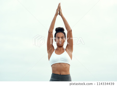 African woman, stretch and yoga for meditation, pilates or wellness for zen and relax for exercise or workout. Yogi, serious and focused for peace environment, mindfulness or breathing for health African woman, stretch and yoga for meditation, pilates or wellness for zen and relax for exercise or workout. Yogi, serious and focused for peace environment, mindfulness or breathing for health 114334439