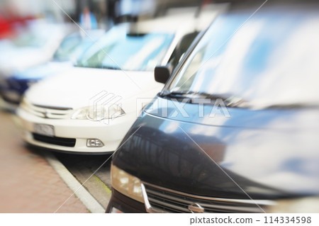 Car park, order with blurred background and transportation in city, stationary vehicle or automobile outdoor. Drive, traffic and auto, concrete or asphalt with urban parking lot in public for order Car park, order with blurred background and transportation in city, stationary vehicle or automobile outdoor. Drive, traffic and auto, concrete or asphalt with urban parking lot in public for order 114334598