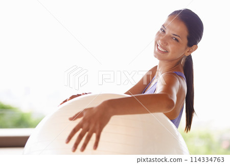 Happy woman, portrait and fitness with exercise ball for workout in health and wellness at home. Face of female person or yogi with smile for gym equipment, training or pilates on outdoor balcony 114334763