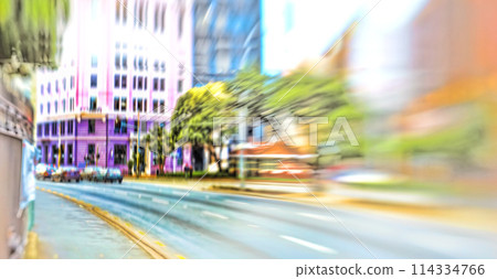 Street, city and blur of cars, traffic and urban buildings outdoor in New York cityscape. Motion, town and road with fast transport, architecture or infrastructure on landscape background in USA Street, city and blur of cars, traffic and urban buildings outdoor in New York cityscape. Motion, town and road with fast transport, architecture or infrastructure on landscape background in USA 114334766