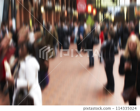 People, walking and train station with motion blur of busy sector for commute or travel in city. Group, community or crowd of population moving in town square, destination or public stop for tourists 114335024
