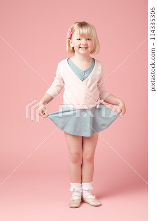 Portrait, child or girl by pink background for ballet, training and practice dance with smile in studio. Mockup space, ballerina or little kid for creativity, childhood development and performance 114335306