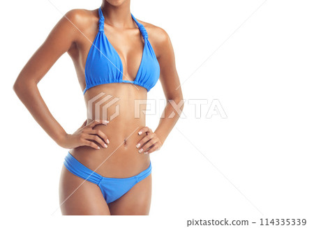 Body, care and stomach of girl with bikini in studio for wellness, detox or diet progress and results on white background. Swimwear, WEIGHT LOSS or model belly confident with vacation swimsuit choice Body, care and stomach of girl with bikini in studio for wellness, detox or diet progress and results on white background. Swimwear, WEIGHT LOSS or model belly confident with vacation swimsuit choice 114335339