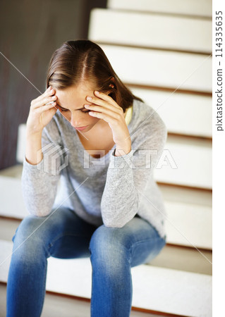 Stress, headache and woman in house with burnout, depression or mental health, crisis or disaster. Stairs, vertigo or dizzy female person with migraine, anxiety or overwhelmed by brain fog or mistake Stress, headache and woman in house with burnout, depression or mental health, crisis or disaster. Stairs, vertigo or dizzy female person with migraine, anxiety or overwhelmed by brain fog or mistake 114335635