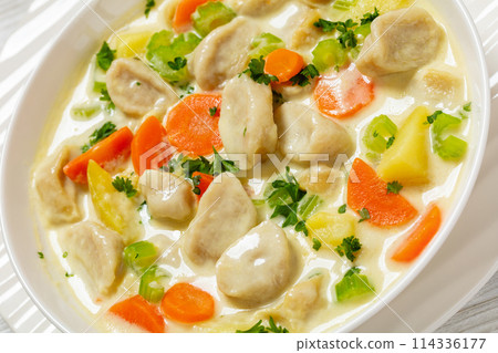 Knoephla soup, german dumpling soup in a bowl Knoephla soup, german dumpling soup in a bowl 114336177