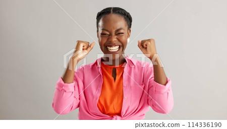 Yes, face and black woman with winner fist celebration in studio excited for competition results on grey background. Success, bonus or portrait of female model with emoji hands for giveaway promotion 114336190