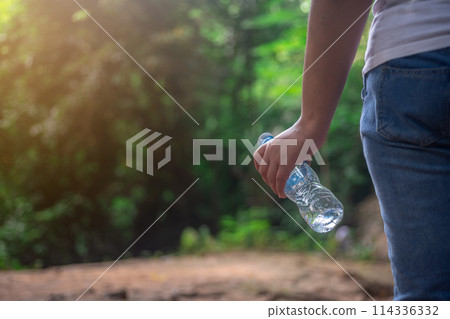 Conservation of natural tourist attractions, Sustainable tourism, Tourists are collecting plastic waste from natural attractions to put in trash cans 114336332