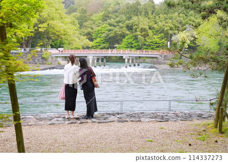 Uji, Kyoto - Kanryu Bridge and tourists from Tower Island (Uji Park) (late spring) Uji, Kyoto - Kanryu Bridge and tourists from Tower Island (Uji Park) (late spring) 114337273