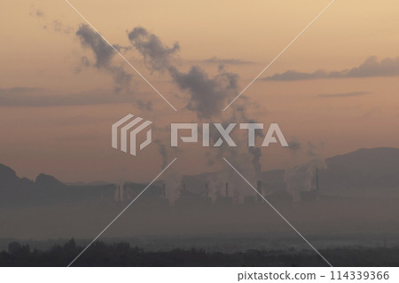 Beautiful morning scenery with fog in the background at Mae Moh Lignite Coal Power Plant, Lampang, Thailand Beautiful morning scenery with fog in the background at Mae Moh Lignite Coal Power Plant, Lampang, Thailand 114339366