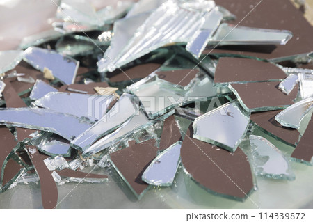 Broken mirror fragments - waste material image 114339872