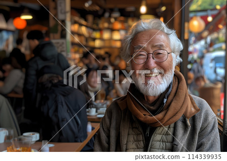 Smiling korean senior man with glasses in a lively cafe environment Smiling korean senior man with glasses in a lively cafe environment 114339935