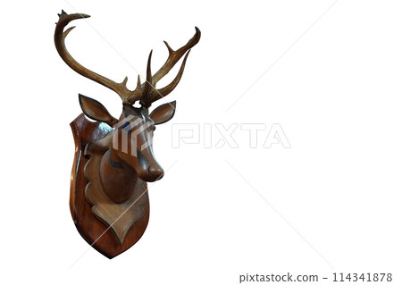 antique wooden deer head mounted on a piece of wood, on white background, decor, wood, fashion, ancient, copy space 114341878