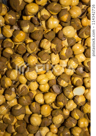 A picture of dry roasted chickpeas with selective focus 114342716