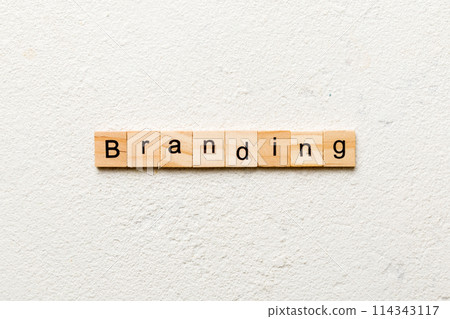branding word written on wood block. branding text on table, concept branding word written on wood block. branding text on table, concept 114343117