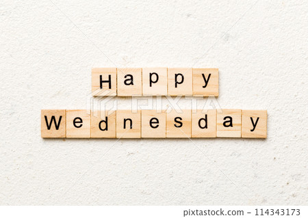 Happy wednesday word written on wood block. Happy wednesday text on cement table for your desing, concept. 114343173