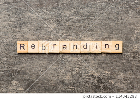 rebranding word written on wood block. rebranding text on table, concept 114343288