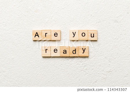 Are You Ready word written on wood block. Are You Ready text on table, concept 114343307