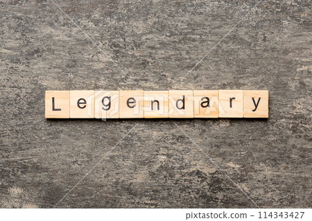 Legendary word written on wood block. Legendary text on cement table for your desing, Top view concept 114343427