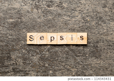 Sepsis word written on wood block. Sepsis text on cement table for your desing, concept 114343431