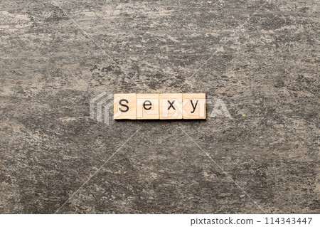 sexy word written on wood block. sexy text on table, concept sexy word written on wood block. sexy text on table, concept 114343447
