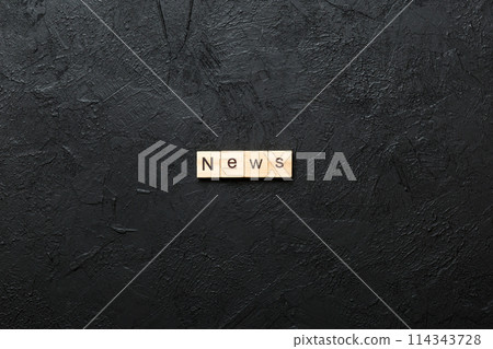 news word written on wood block. news text on table, concept news word written on wood block. news text on table, concept 114343728