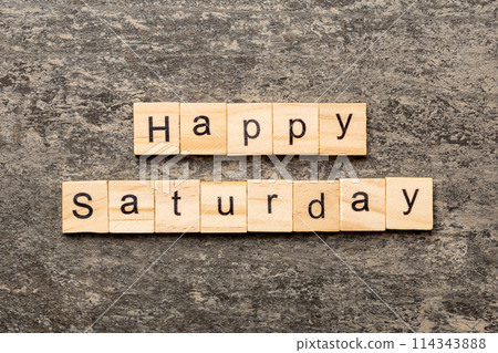 Happy saturday word written on wood block. Happy saturday text on cement table for your desing, concept Happy saturday word written on wood block. Happy saturday text on cement table for your desing, concept 114343888