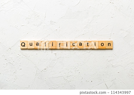 qualification word written on wood block. qualification text on table, concept qualification word written on wood block. qualification text on table, concept 114343997