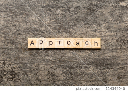 APPROACH word written on wood block. APPROACH text on cement table for your desing, concept APPROACH word written on wood block. APPROACH text on cement table for your desing, concept 114344040